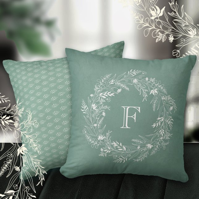 Coussin Couronne délicate de feuilles blanches avec la let (Créateur téléchargé)