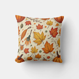 Coussin coussin avec feuilles et citrouilles tombé