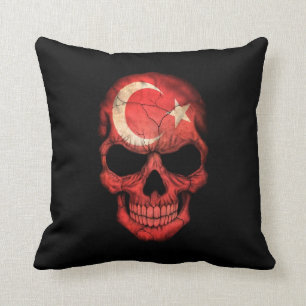 Coussin Crâne turc de drapeau sur le noir