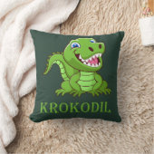 Coussin crocodile vert foncé (Couverture)