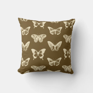 Coussin Croquis de papillon, beige sur chocolat