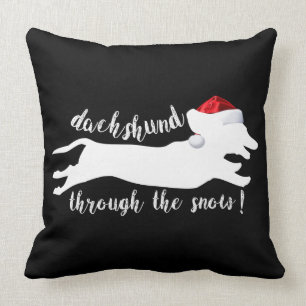 Coussin Dachshund à travers la neige Noël