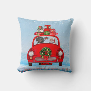 Coussin Dachshund dans une voiture avec le Père Noël
