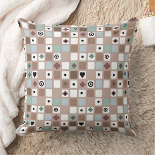 Coussin Dans des tons turquoise beige motif géométrique