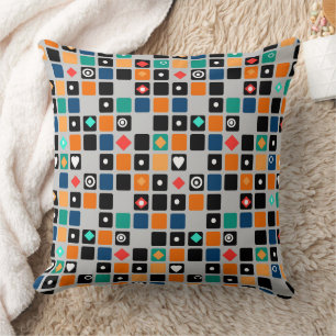 Coussin Dans un motif géométrique de couleurs multicolores