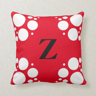 Coussin de carré de monogramme, rouge de noir de