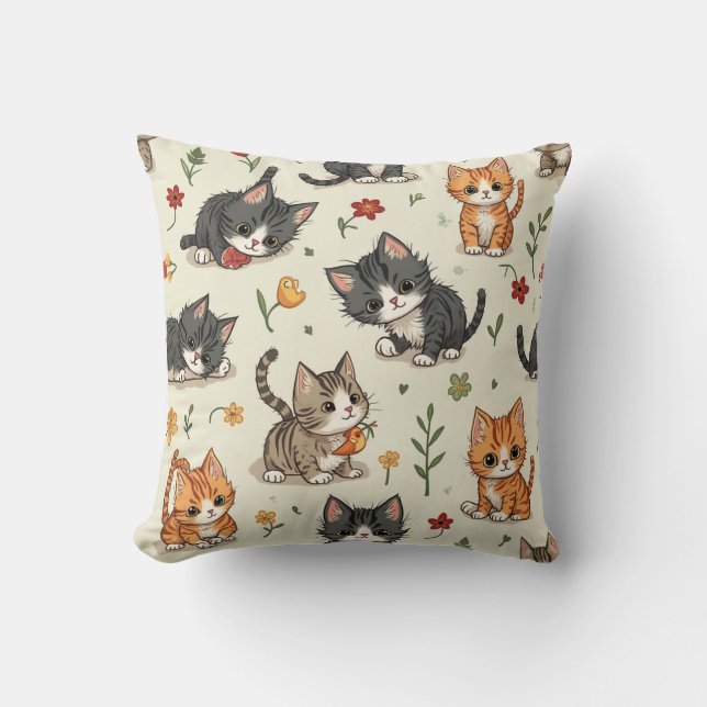Coussin de chat mignon jouant avec des jouets. (Recto)
