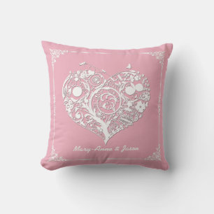 Coussin de décorateur de coeur rose et blanc