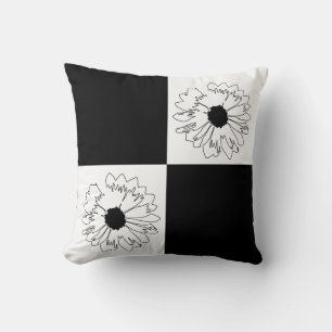 coussin de fleurs À damiers noir et blanc