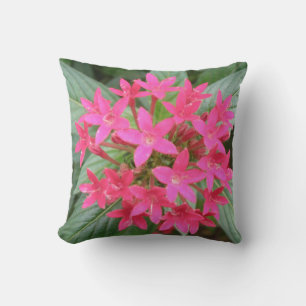 Coussin de fleurs tropicales rose vif