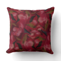 Coussin de jet à motif floral bordeaux