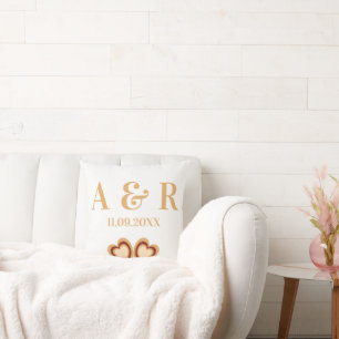 Coussin de jeté de mariage à monogramme de couple 