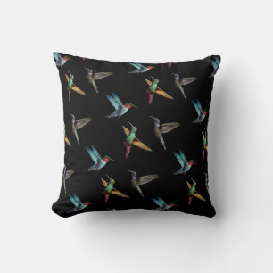 Coussin De mignons colibris multicolores sur fond noir