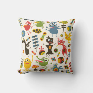 Coussin de monstres heureux