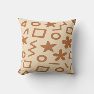 Coussin décoratif beige et brun rougeâtre