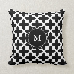 Coussin décoré d'un monogramme de motif blanc no
