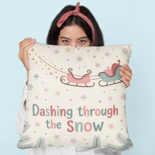 Coussin Défilant dans la neige Noël pastel cosy