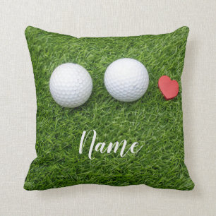 Coussin Deux balles de golf et le coeur de l'amour sont su