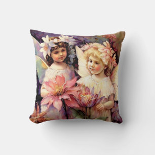 Coussin Deux enfants de fées dans un jardin fleuri