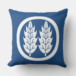 Coussin Deux feuilles de houx parallèles dans un cercle