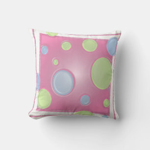 Coussin DOTS dimensionnels sur fond rose
