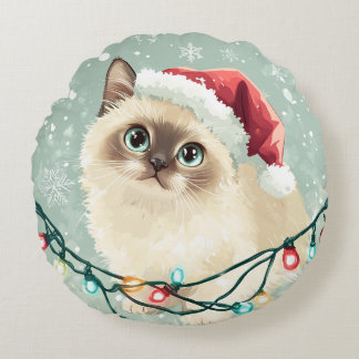 Coussin d'un chat dans un casquette de Noël
