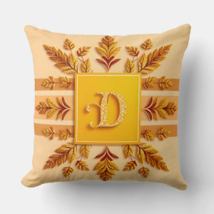 Coussin Élégants motifs de monogramme avec feuilles dorées