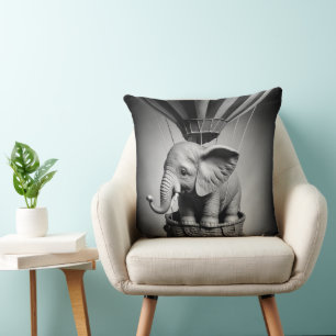 Coussin Elephant bébé dans un ballon à air chaud