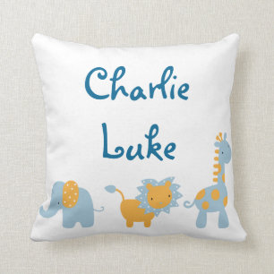 Coussin Éléphant, lion et girafe bleus et oranges