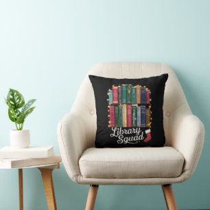 Coussin Équipe de lecture de la bibliothèque de Noël amate