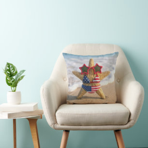 Coussin Étoile de mer portant un bikini à drapeau et des l