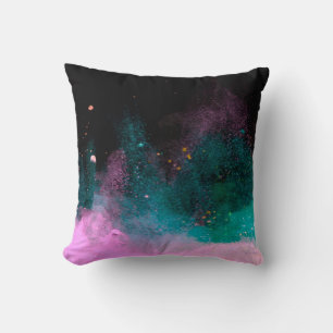 Coussin Explosion of colored powder isolated on black back