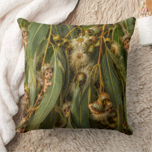 Coussin Fées bébés Gumnut regardant derrière les feuilles