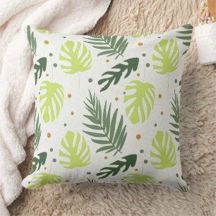 Coussin Feuilles et pois tropicaux sur la texture.