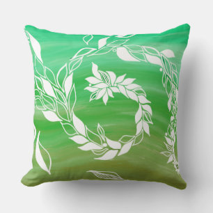 Coussin Feuilles tourbillonnants verts et fleurs
