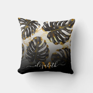 Coussin Feuilles tropicaux noirs et dorés