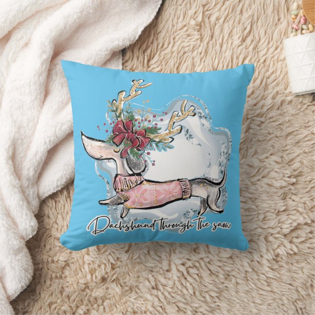 Coussin Fille teckel à travers la neige (Couverture)