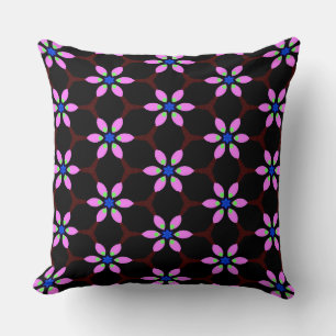 Coussin Fleur à six pétales roses vifs pointillés de vert