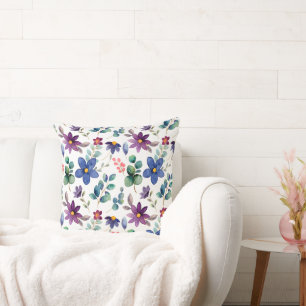 Coussin fleur violet bleu avec motif feuille vert