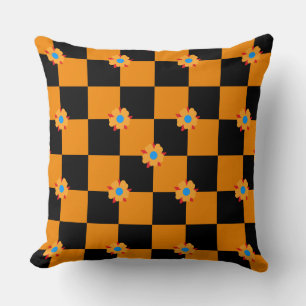 Coussin Fleurs à carreaux orange et noir