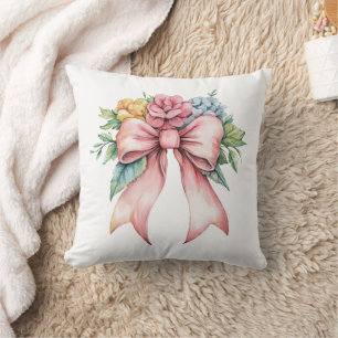 Coussin Fleurs aquarelles à ruban rose pour nurserie ou ch