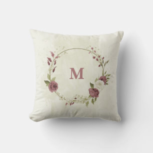 Coussin fleurs blanches rose poussiéreux