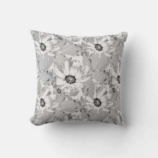 Coussin Fleurs blanches sur gris clair.