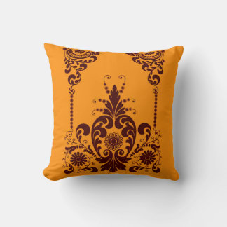 Coussin fleurs orange et impression de volutes