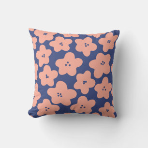 Coussin Fleurs pastel orange sur fond bleu vif