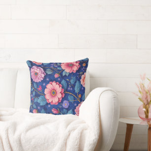 Coussin Fleurs roses sur motif bleu vibrant