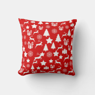 Coussin flocon de neige blanc de Noël sur fond rouge abstr