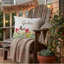 Coussin Flore rouge jaune et bleu avec papillon