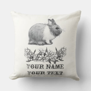Coussin Fluffez le lapin. Carton noir monochrome
