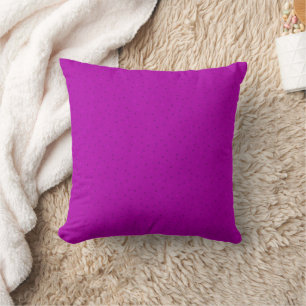 Coussin Fouchsia brillante avec de petits pois.